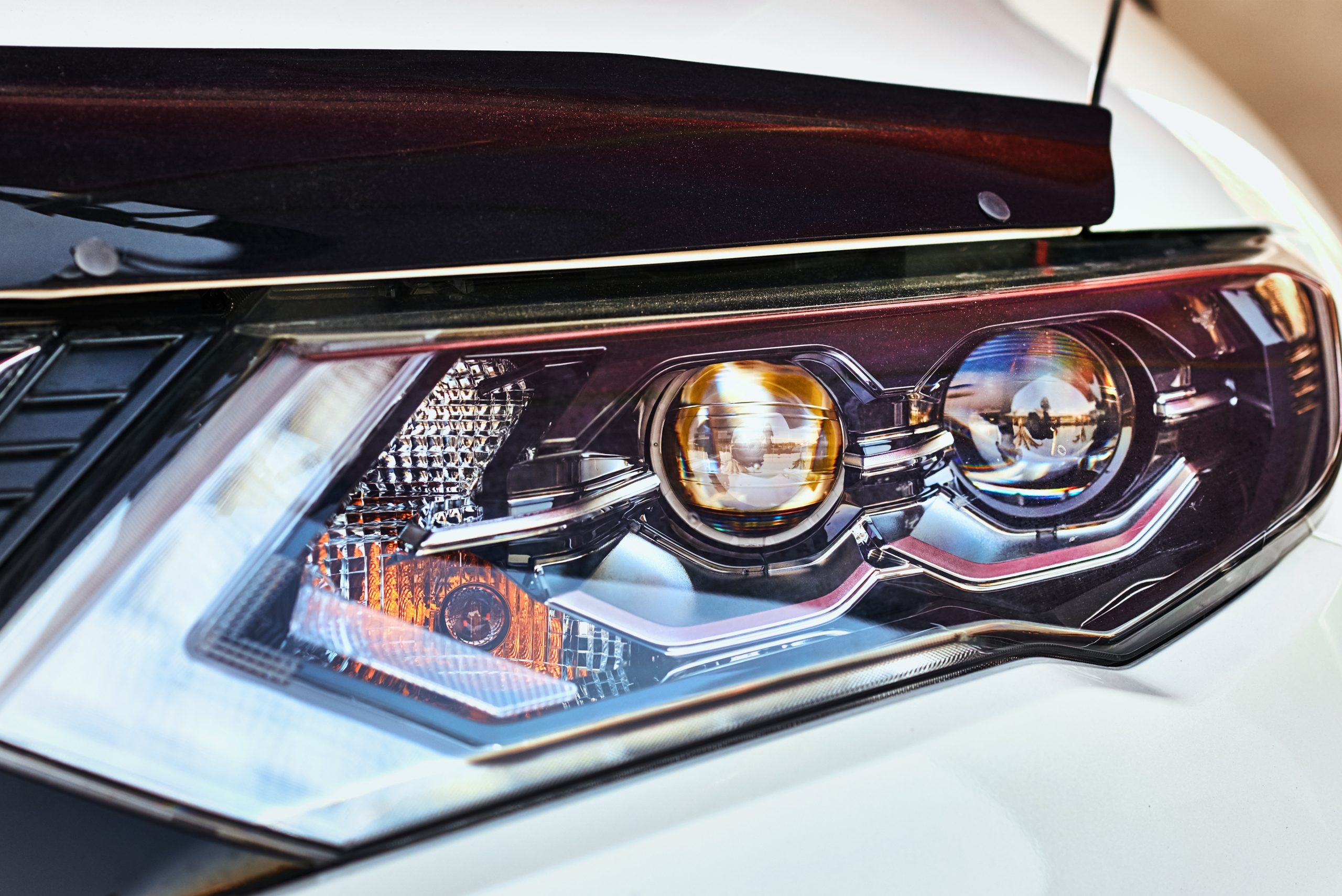 Close up of modern car headlight with led lamp